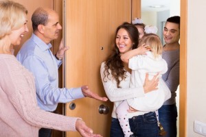 parents at door greeting kids